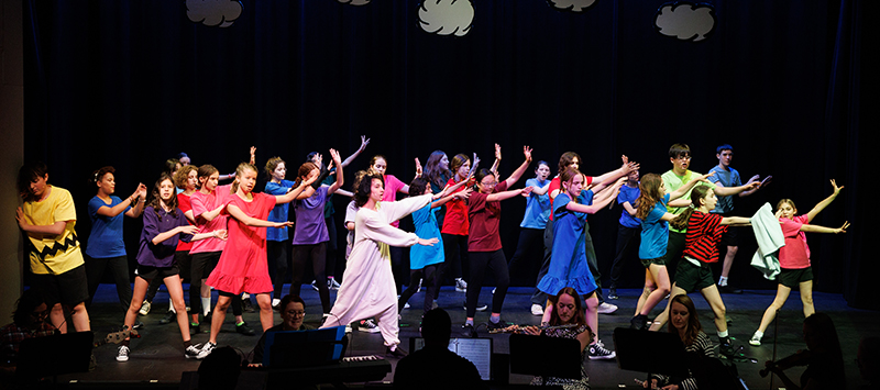 Students performing "You're a Good Man, Charlie Brown"