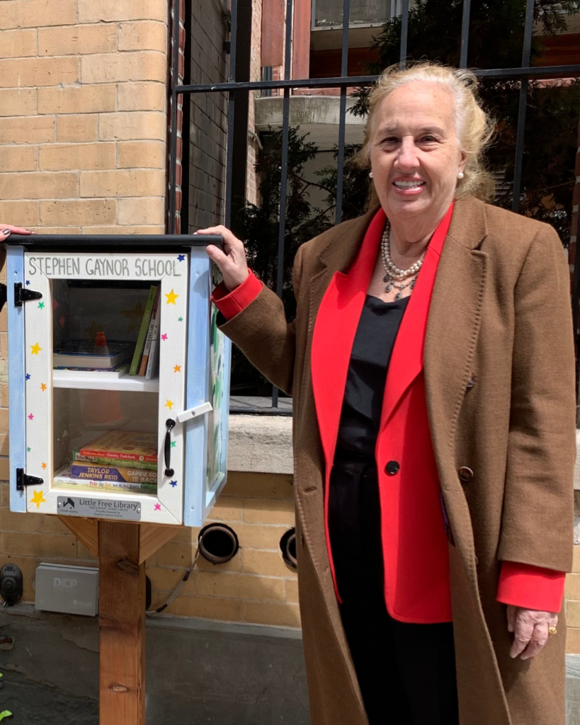New York City Council Member Gale Brewer with the Little Free Library